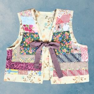 Upcycled quilt vest with bow patchwork cottagecore